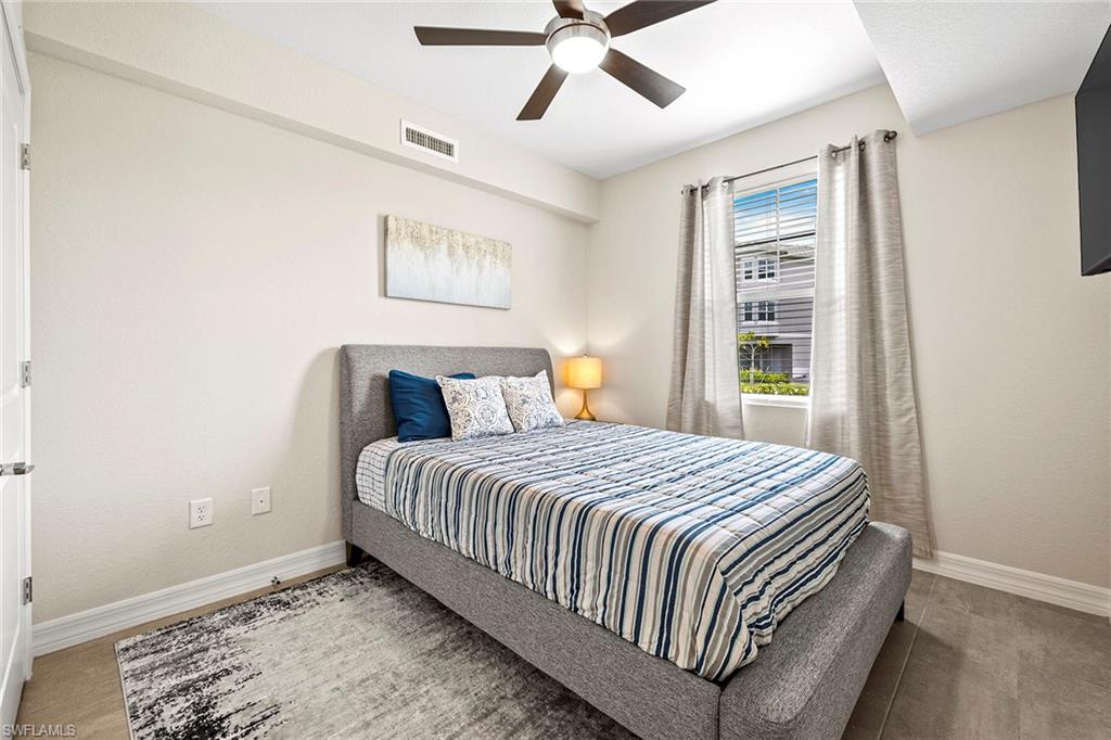 172 Indies Drive East, Unit 101 Naples, FL 34114 - Photo 17 of 33 Bedroom 2 Queen Bed