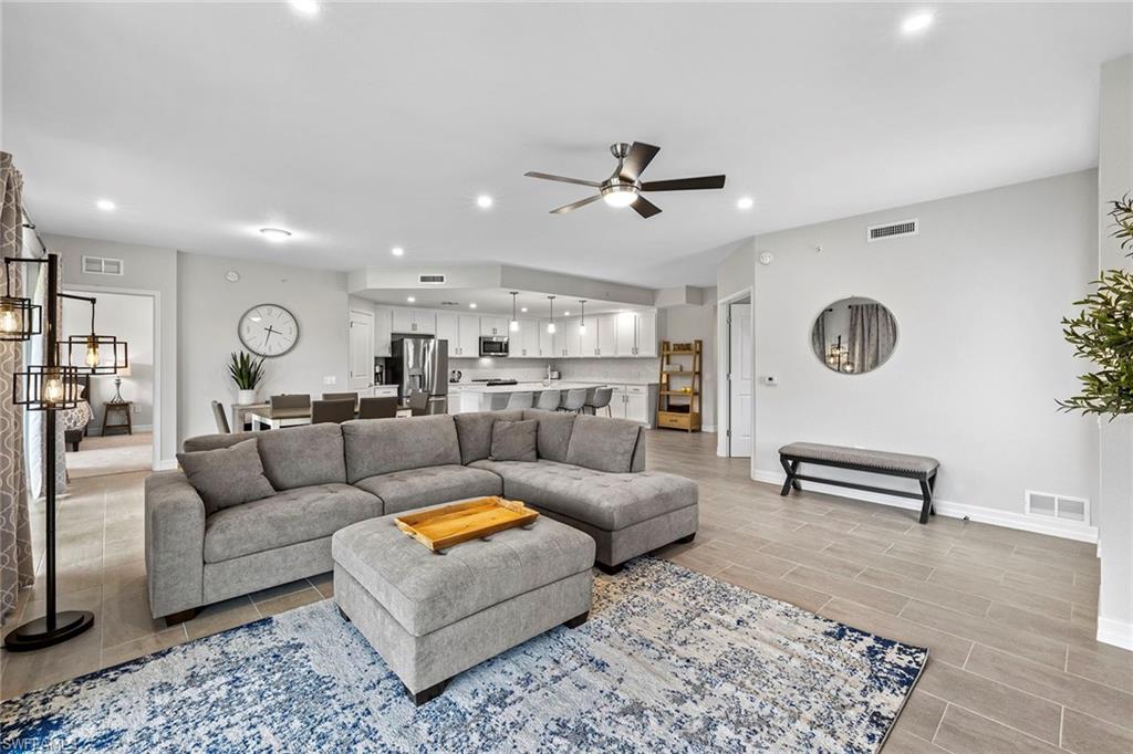 172 Indies Drive East, Unit 101 Naples, FL 34114 - Photo 3 of 33 Living Room