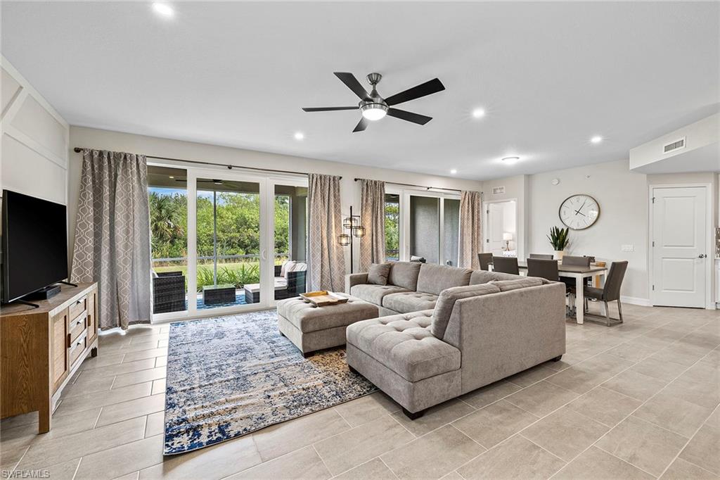 172 Indies Drive East, Unit 101 Naples, FL 34114 - Photo 5 of 33 Living room