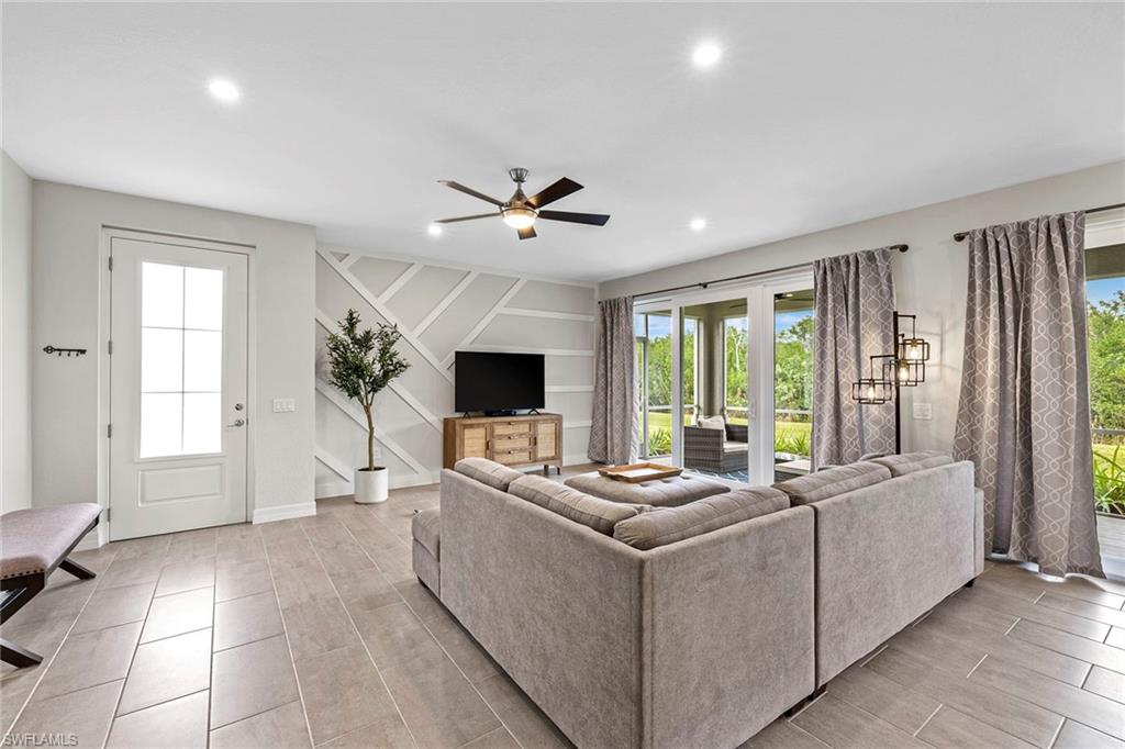 172 Indies Drive East, Unit 101 Naples, FL 34114 - Photo 6 of 33 Entrance/Living Room