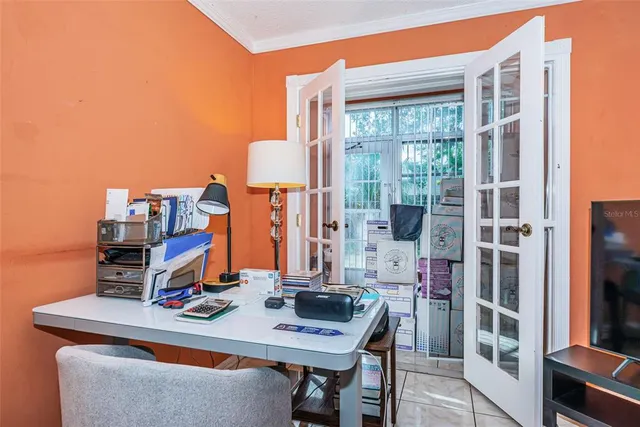 a view of a workspace with furniture