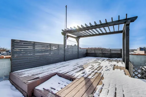 a view of a terrace with seating area