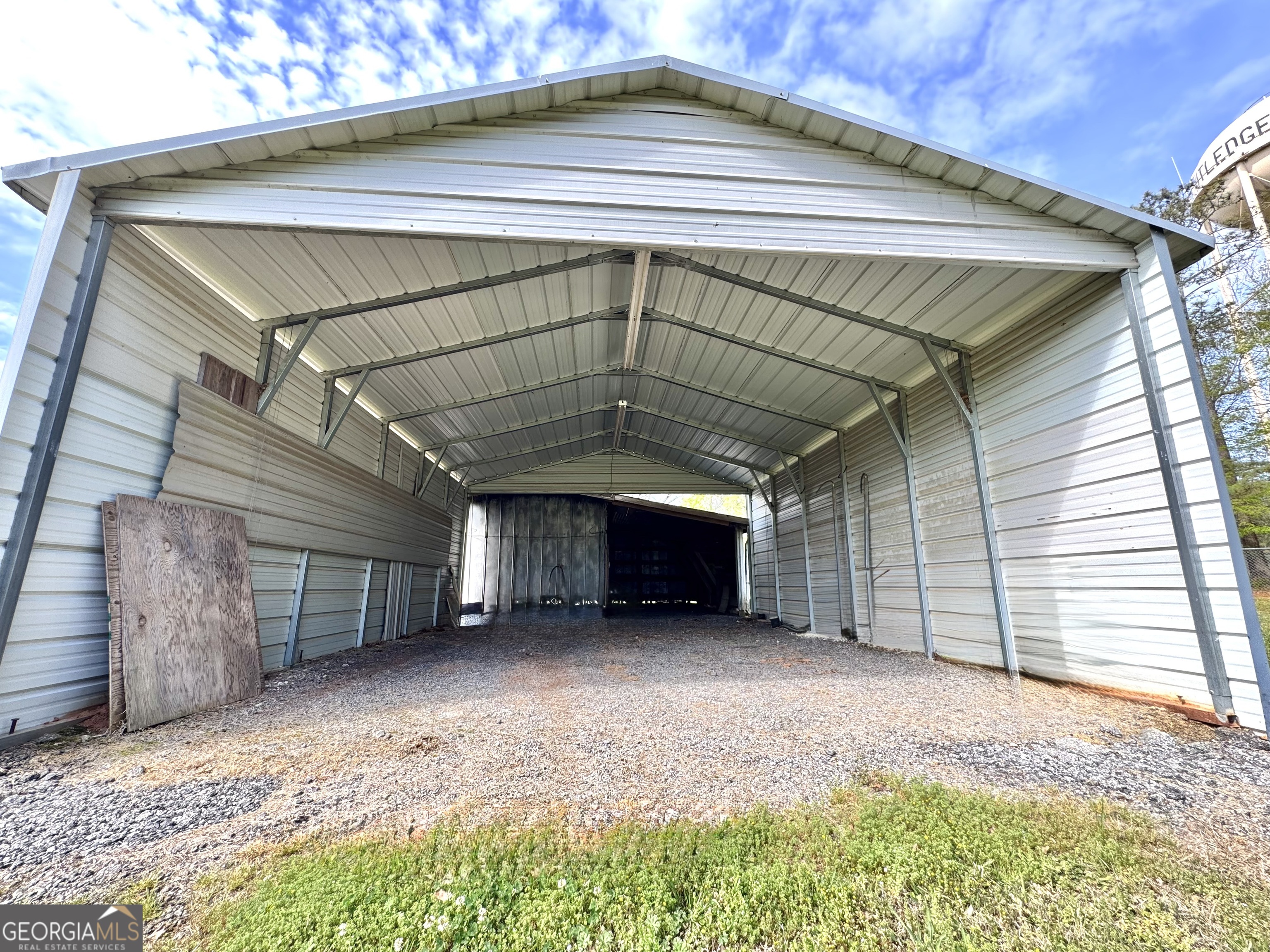1760 Fears Road Rutledge, GA 30663 - Photo 57 of 68 a view of an empty room with a garage