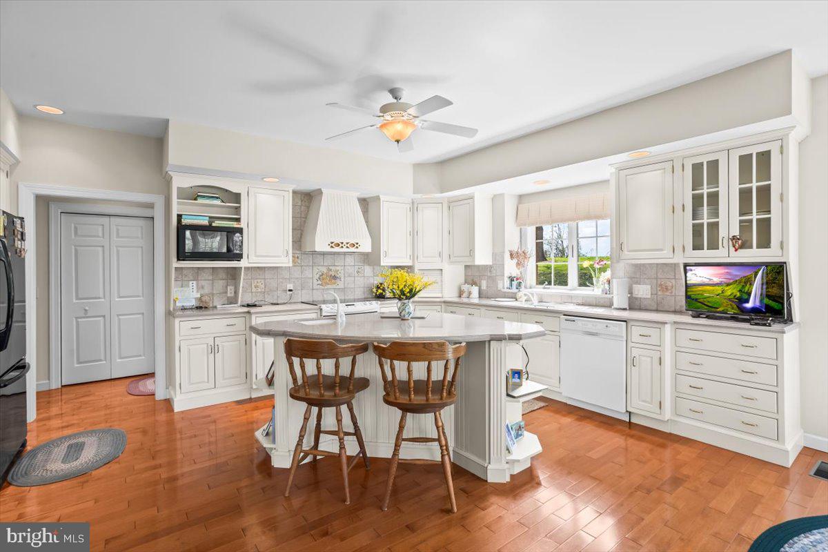 315 Rocherty Road Lebanon, PA 17042 - Photo 12 of 55 a kitchen with a table chairs stove and cabinets