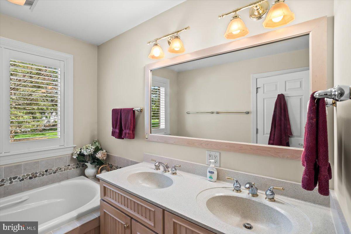 315 Rocherty Road Lebanon, PA 17042 - Photo 22 of 55 a bathroom with a sink and a mirror