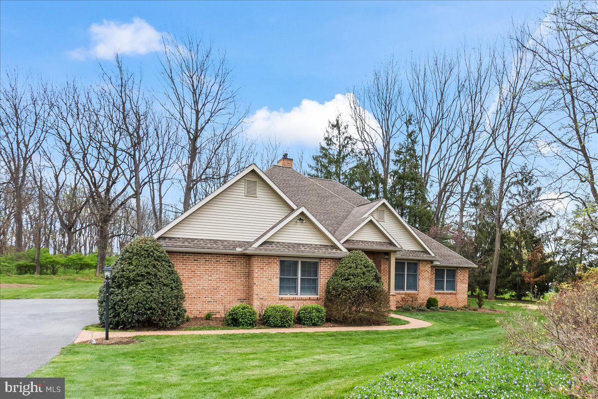 315 Rocherty Road Lebanon, PA 17042 - Photo 37 of 55 a front view of a house with a yard and trees