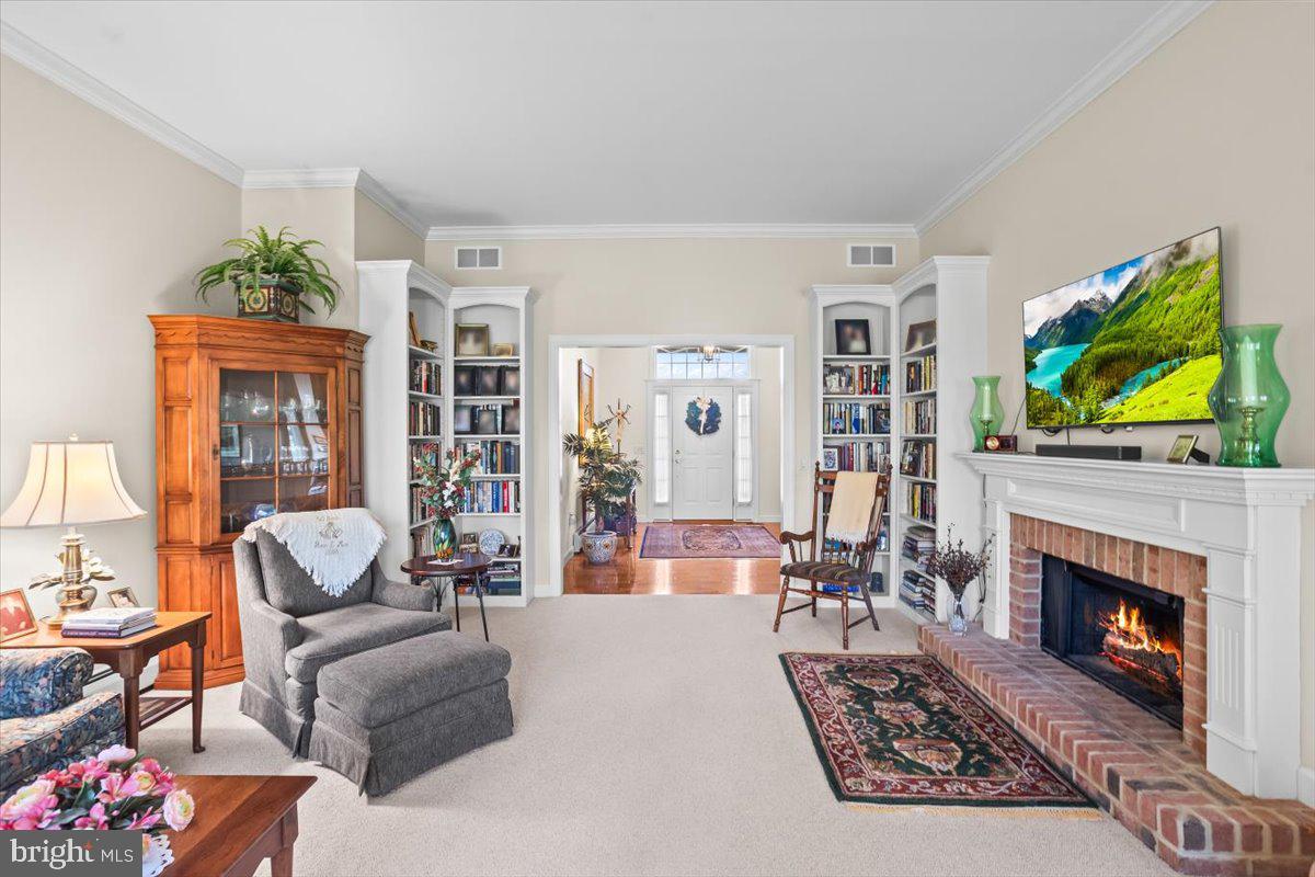315 Rocherty Road Lebanon, PA 17042 - Photo 5 of 55 a living room with furniture a rug and a fireplace