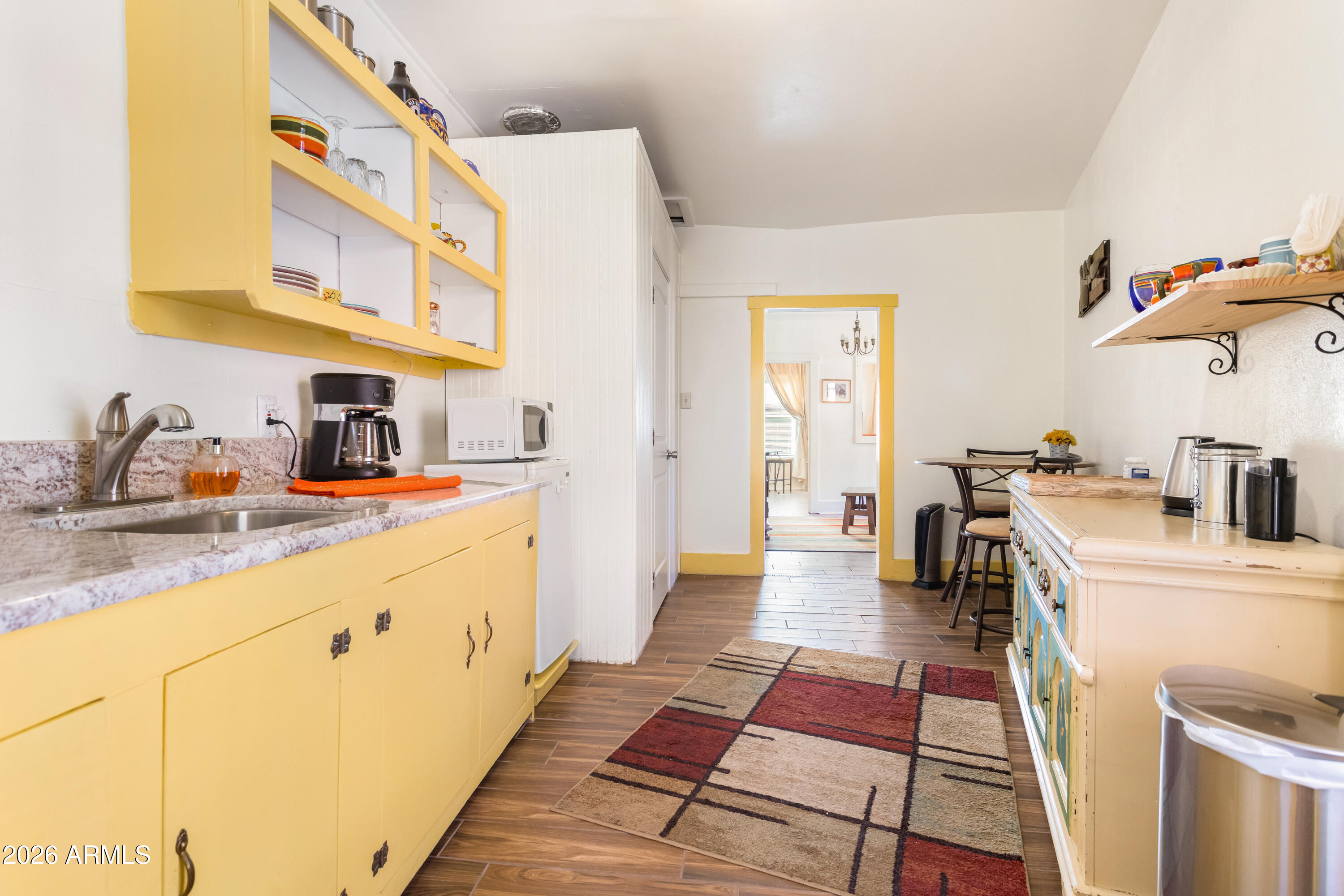 41 Main Street Bisbee, AZ 85603 - Photo 21 of 33 a kitchen with a sink and a stove top oven