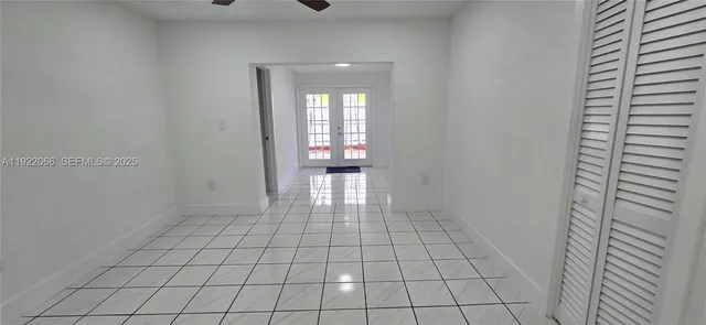 a view of an empty room and window