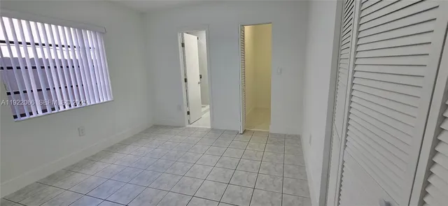 a bathroom with a bathtub and a sink