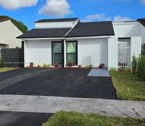 a front view of house with yard
