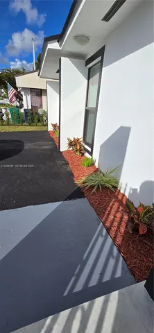 a front view of a house with a garage
