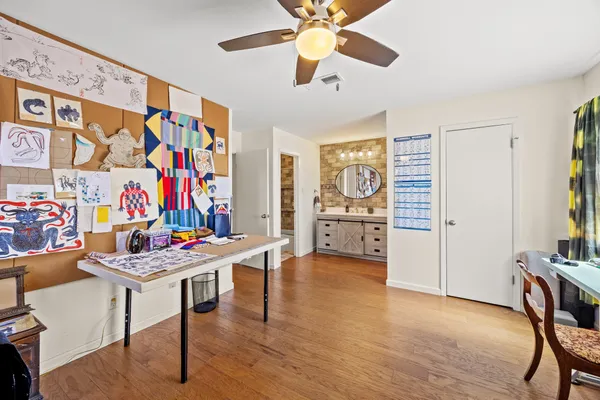 a view of a workspace with furniture and a livingroom