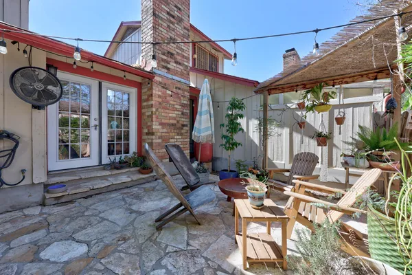 a view of a building with sitting area