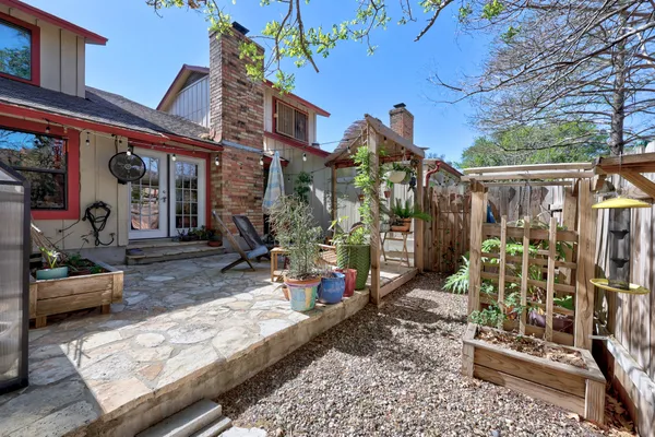 a view of a chairs and tables in patio