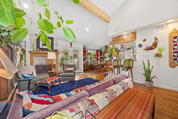 a living room filled with lots of furniture