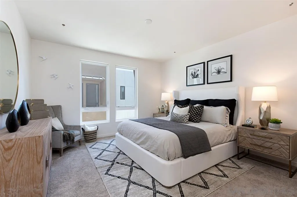 4015 Mission Inn Avenue Riverside, CA 92501 - Photo 14 of 25 a bedroom with a bed and wooden floor