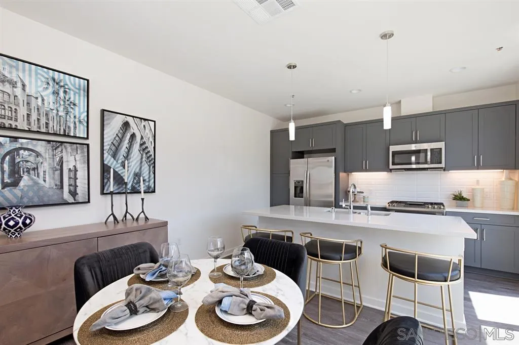 4015 Mission Inn Avenue Riverside, CA 92501 - Photo 8 of 25 a kitchen with a dining table and chairs