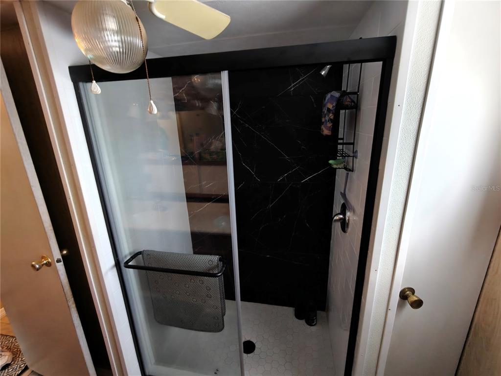 1600 Old Coachman Rd., Unit 806 Clearwater, FL 33765 - Photo 4 of 15 a close view of water heater room