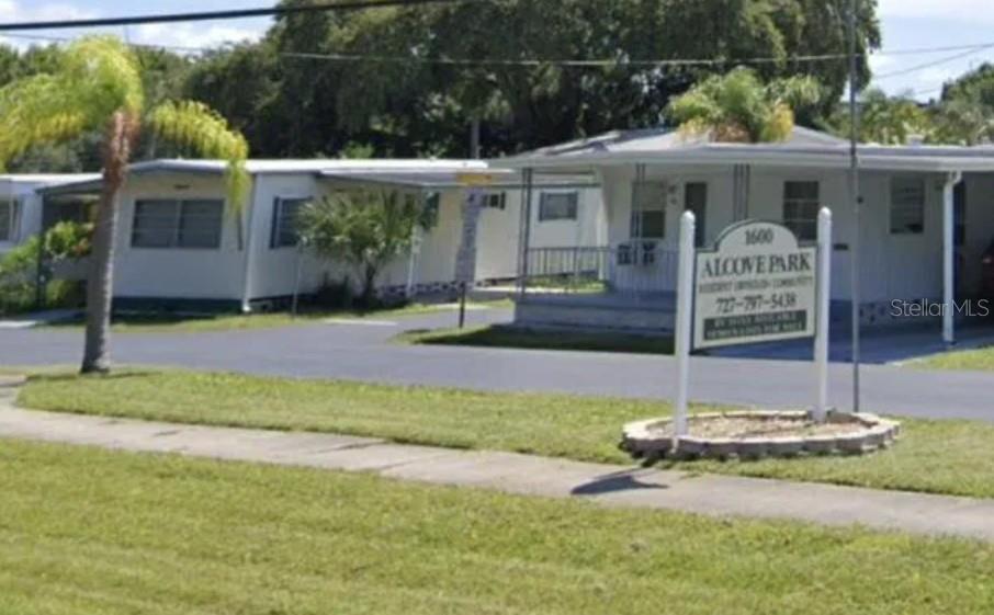1600 Old Coachman Rd., Unit 806 Clearwater, FL 33765 - Photo 10 of 15 a front view of a house with garden