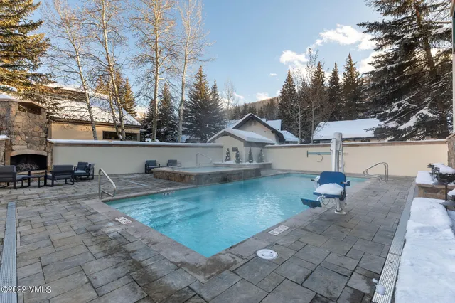 a view of a swimming pool from a balcony