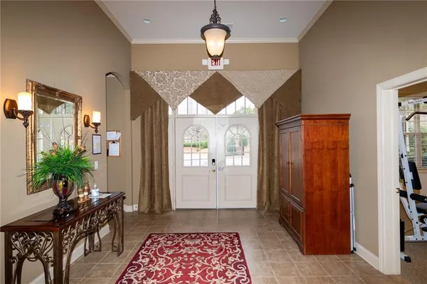 a very nice looking living room with a large window