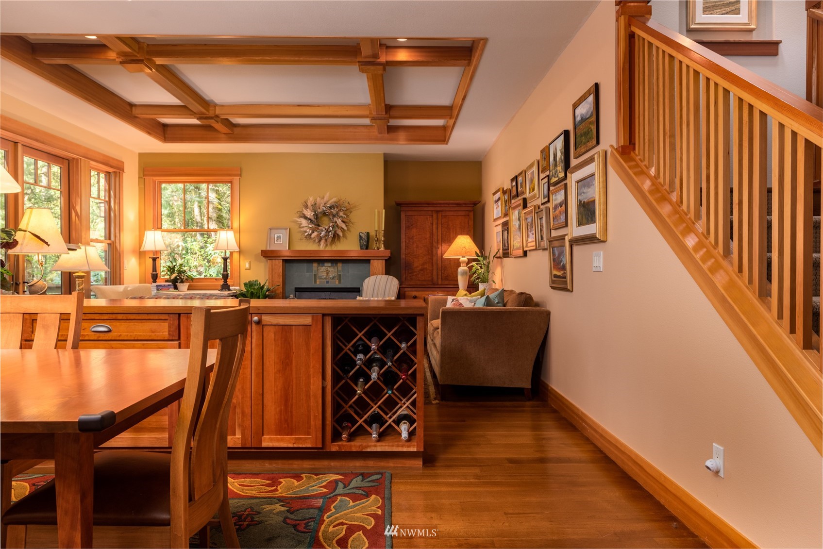 2133 Academy Road Bellingham, WA 98226 - Photo 11 of 40 a dining room with furniture a chandelier and wooden floor