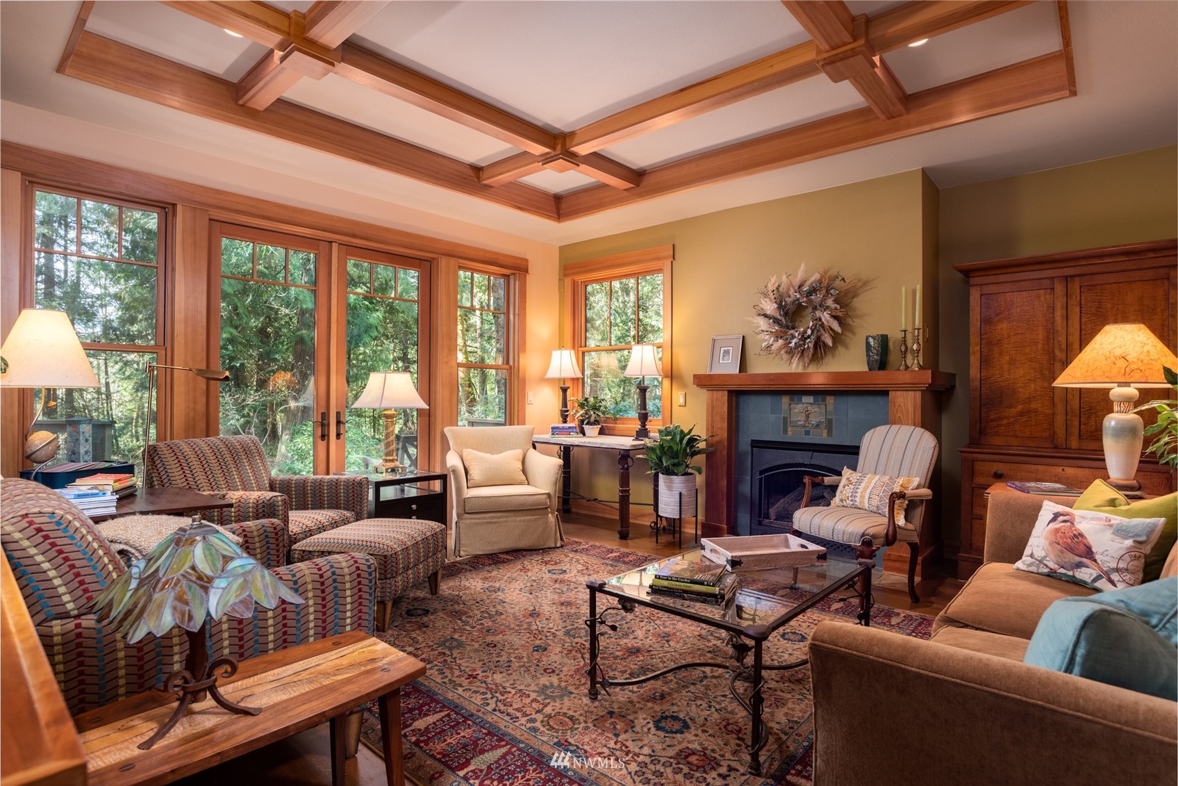 2133 Academy Road Bellingham, WA 98226 - Photo 12 of 40 a living room with furniture a fireplace and a large window