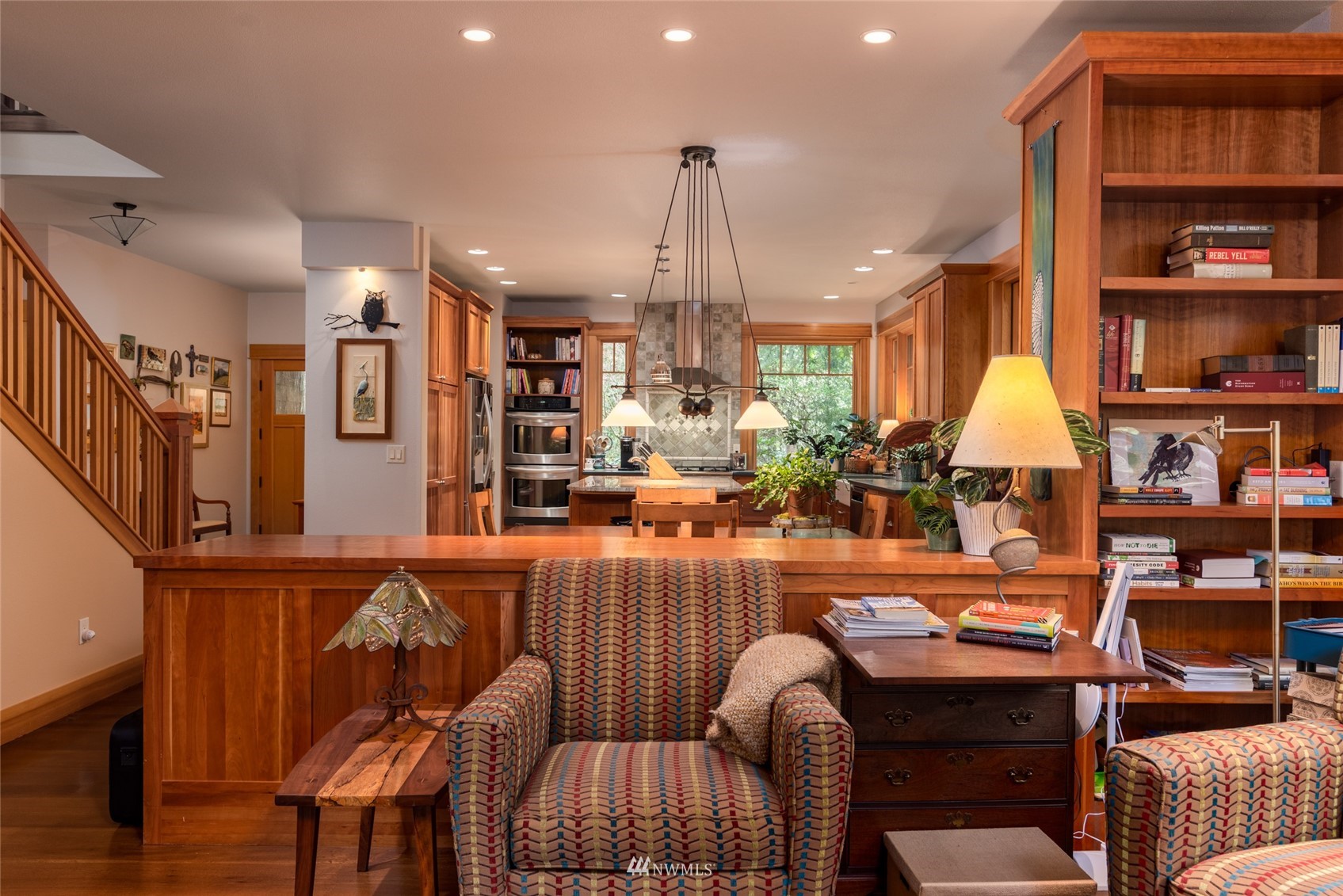 2133 Academy Road Bellingham, WA 98226 - Photo 15 of 40 a dining room filled with furniture and a book shelf