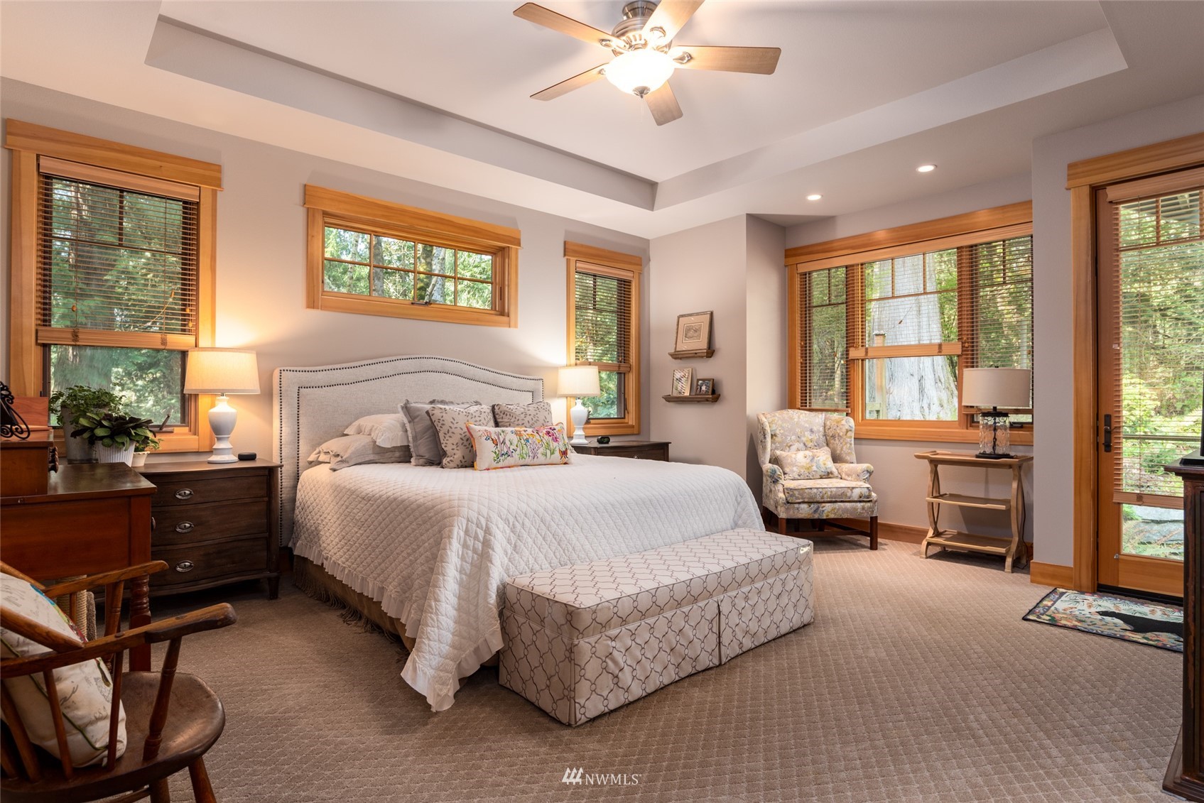 2133 Academy Road Bellingham, WA 98226 - Photo 19 of 40 a bedroom with a bed couch and large windows