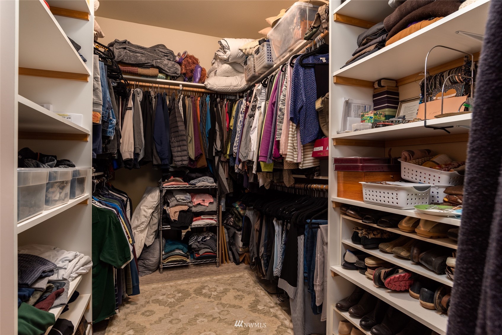 2133 Academy Road Bellingham, WA 98226 - Photo 22 of 40 a view of walk in closet with clothes and shoes