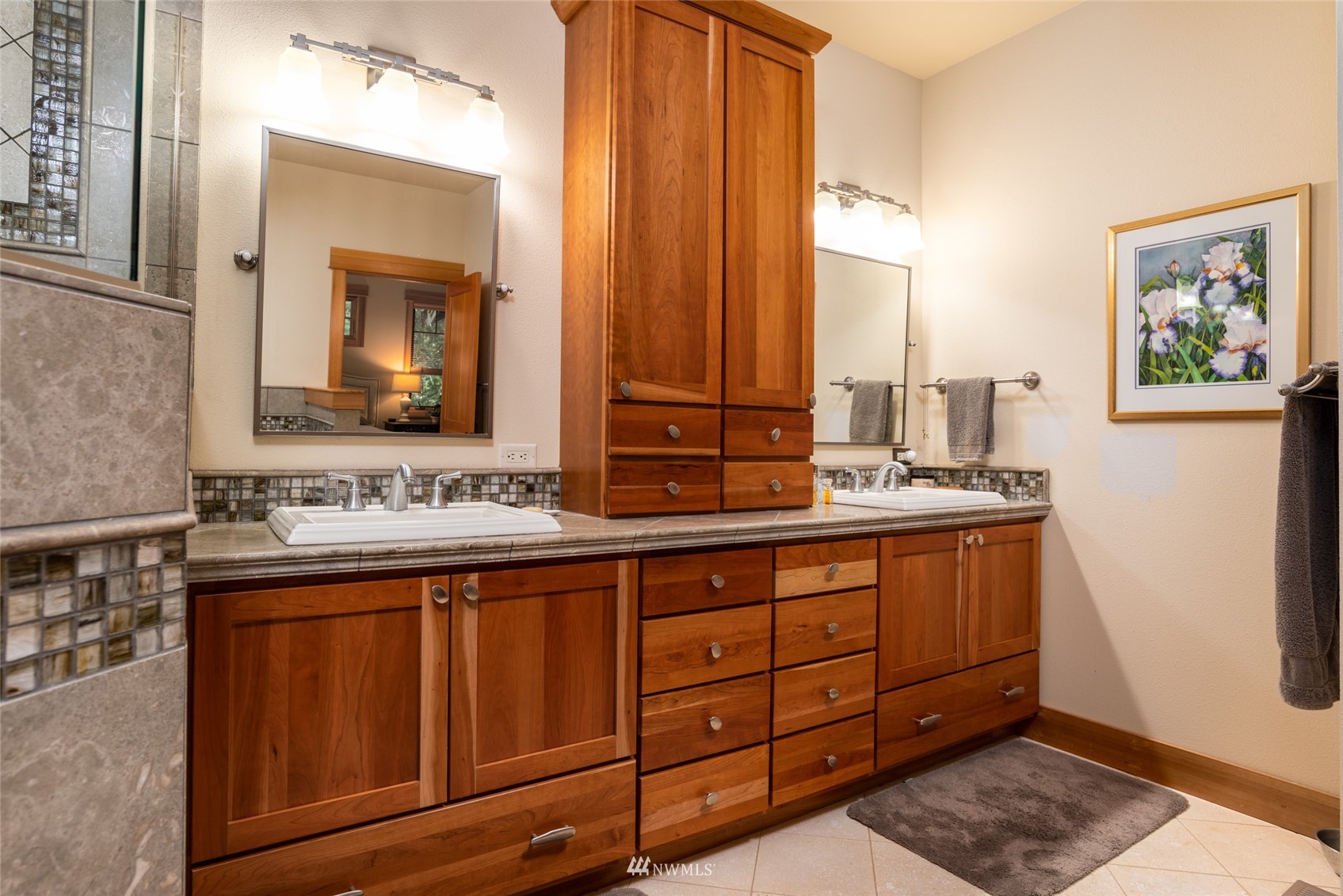 2133 Academy Road Bellingham, WA 98226 - Photo 23 of 40 a bathroom with a double vanity sink and a mirror