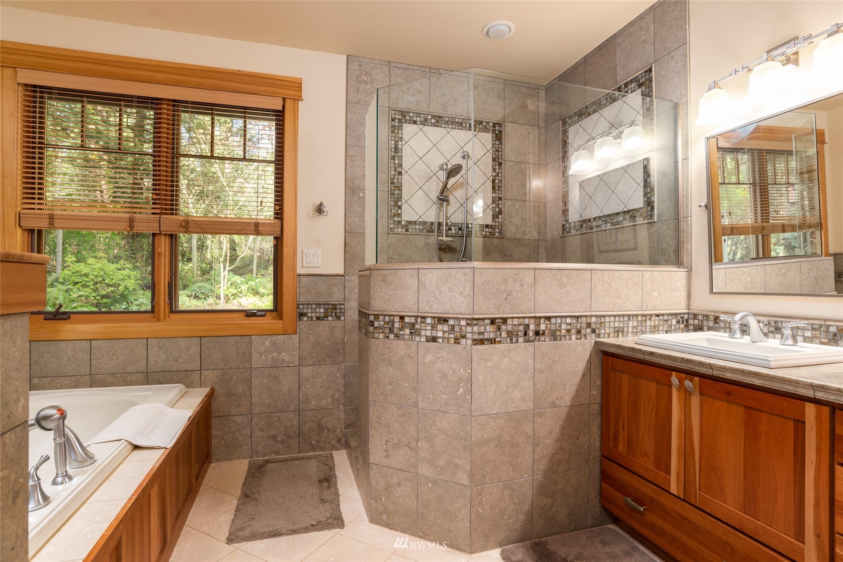 2133 Academy Road Bellingham, WA 98226 - Photo 25 of 40 a bathroom with a tub sink and window