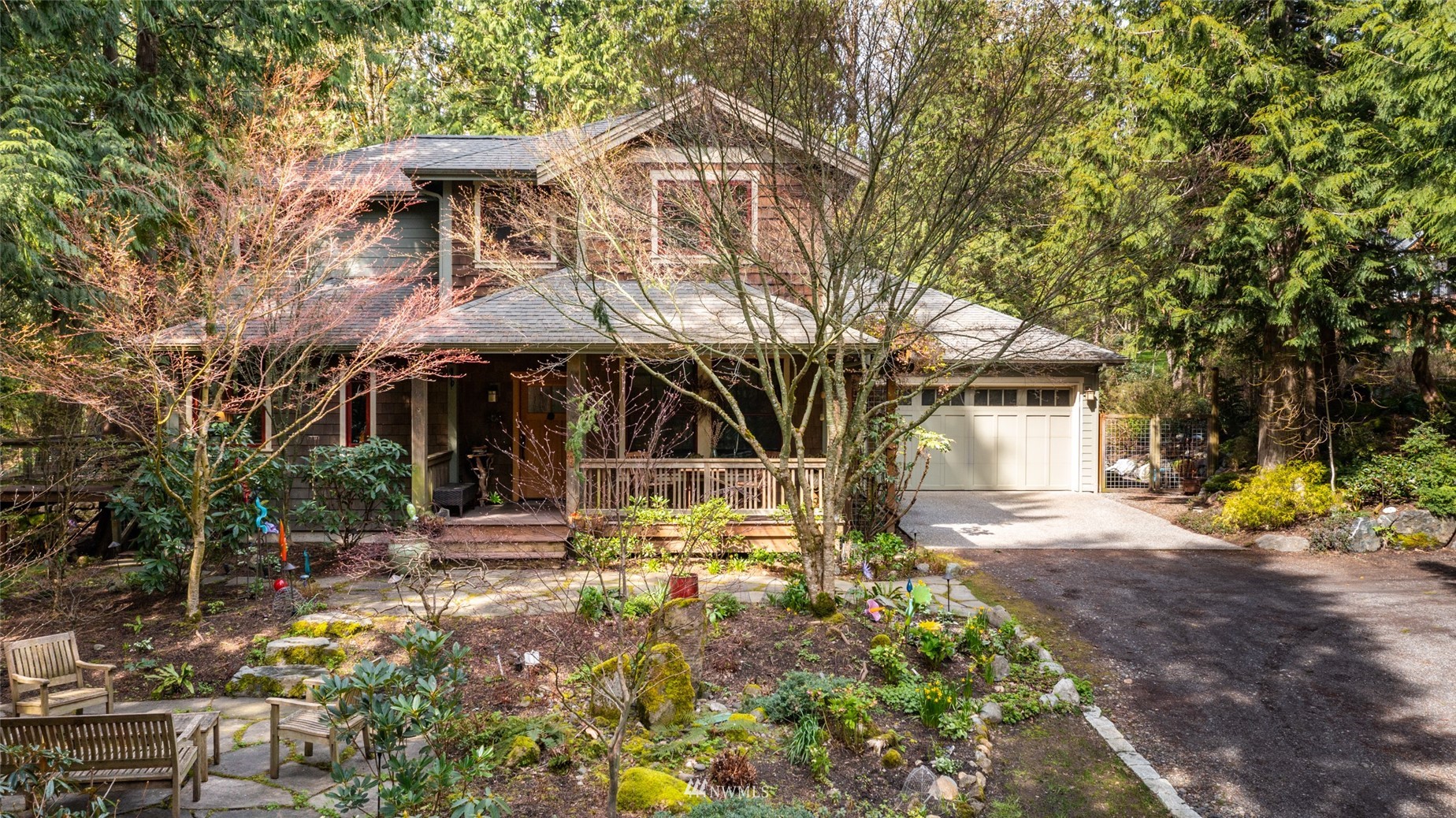 2133 Academy Road Bellingham, WA 98226 - Photo 34 of 40 a view of a house with a yard and sitting area