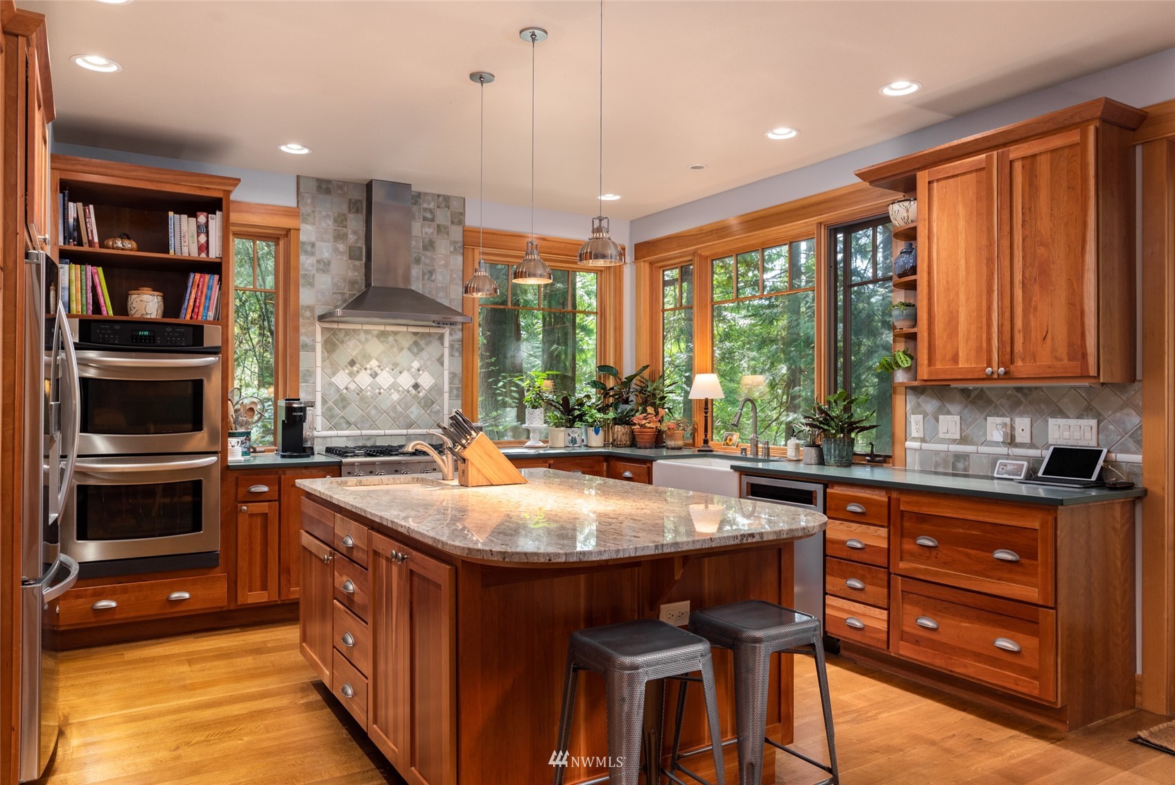 2133 Academy Road Bellingham, WA 98226 - Photo 8 of 40 a kitchen with stainless steel appliances granite countertop a stove and a sink