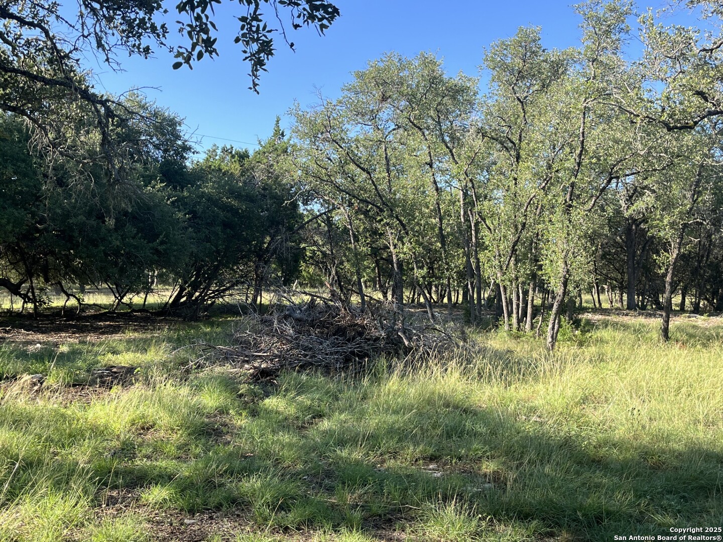 0 Rolling Creek Spring Branch, TX 78070 - Photo 19 of 22 a view of swimming pool with an outdoor seating and a lake view
