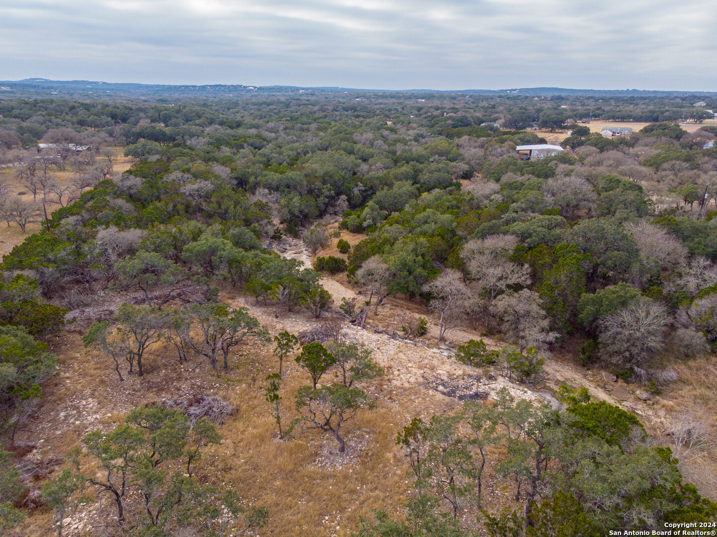 0 Rolling Creek Spring Branch, TX 78070 - Photo 7 of 22 an aerial view of house with yard and mountain view in back