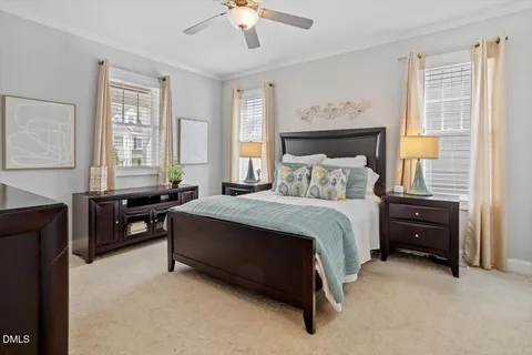 a bed room with a bed and a tv