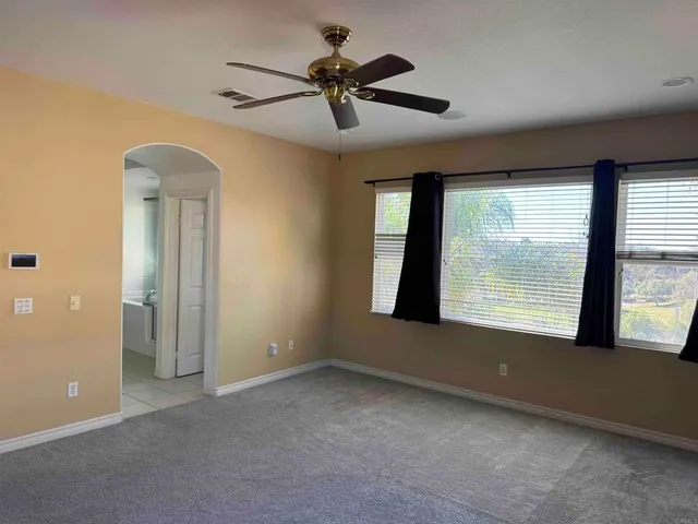 a view of swimming pool from a balcony