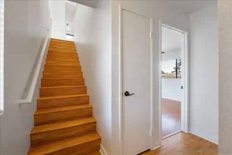 a view of entryway with wooden floor