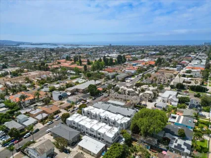 an aerial view of a city with lots of residential buildings