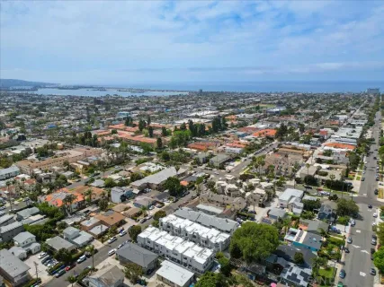 an aerial view of a city with lots of residential buildings