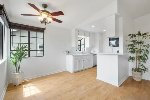a view of kitchen and windows