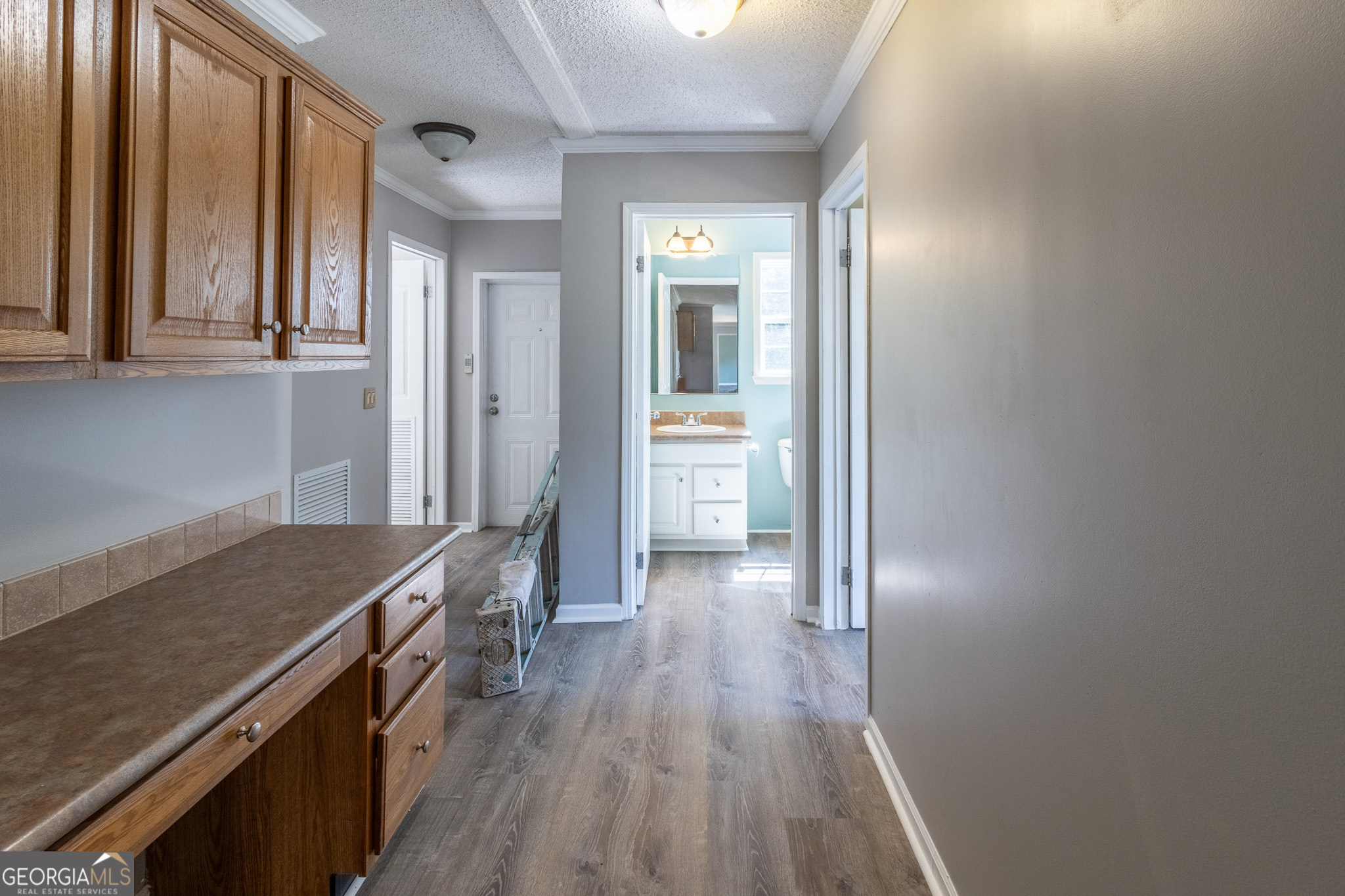 145 County Road Cedar Bluff, AL 35959 - Photo 11 of 21 a kitchen with a wooden floor