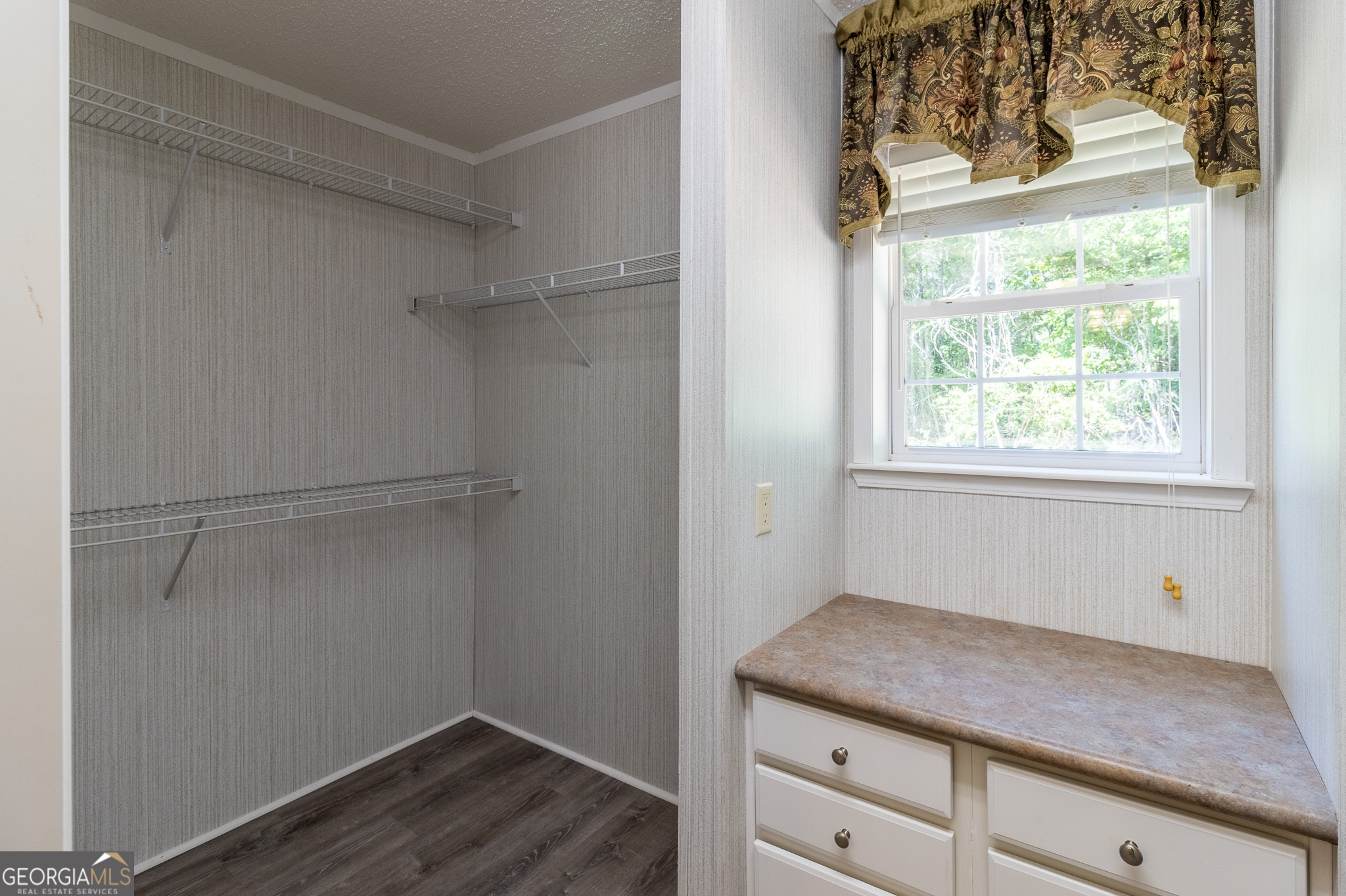 145 County Road Cedar Bluff, AL 35959 - Photo 14 of 21 a room with a cabinets and a window