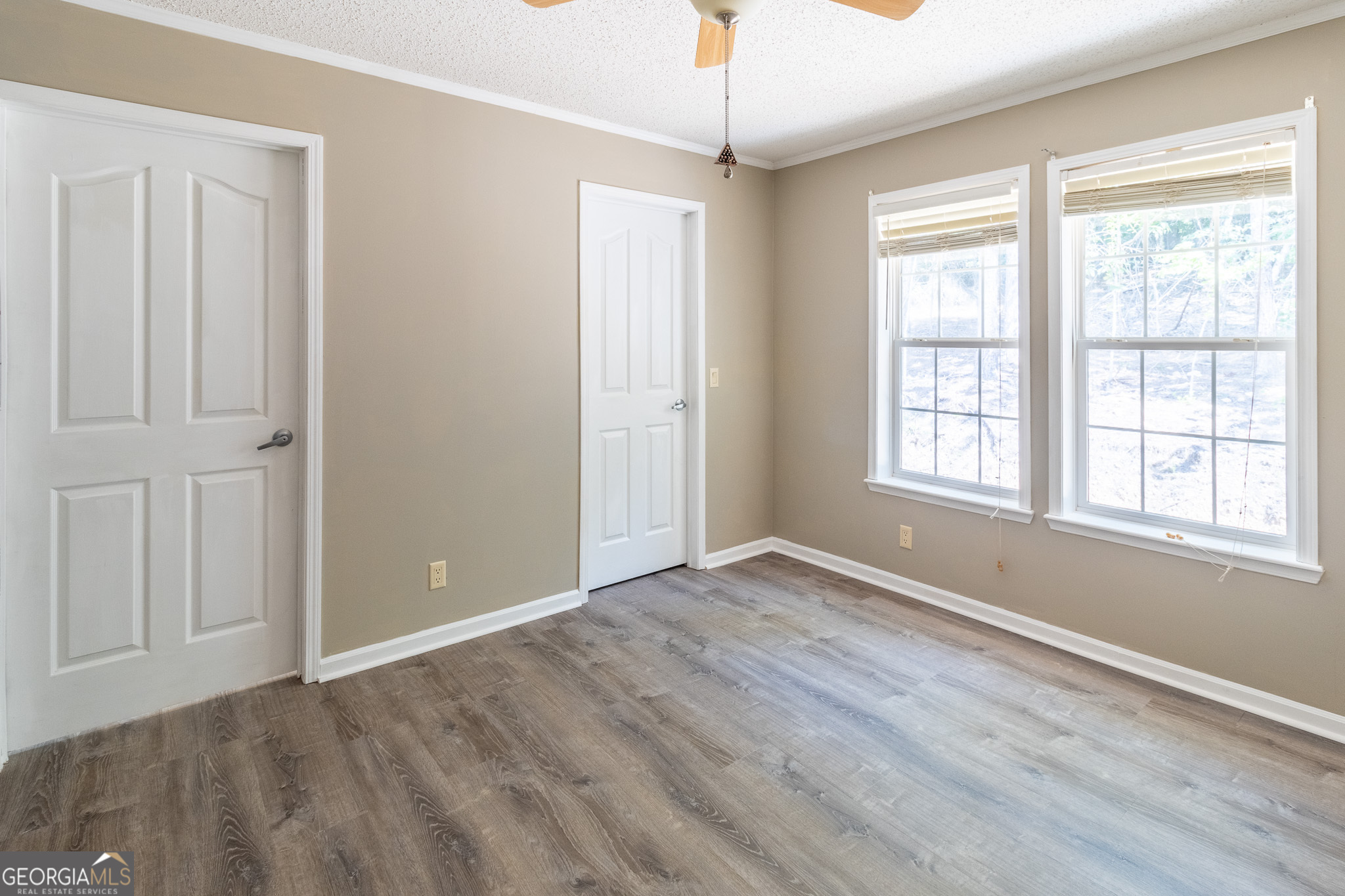 145 County Road Cedar Bluff, AL 35959 - Photo 16 of 21 a view of an empty room with a window and wooden floor