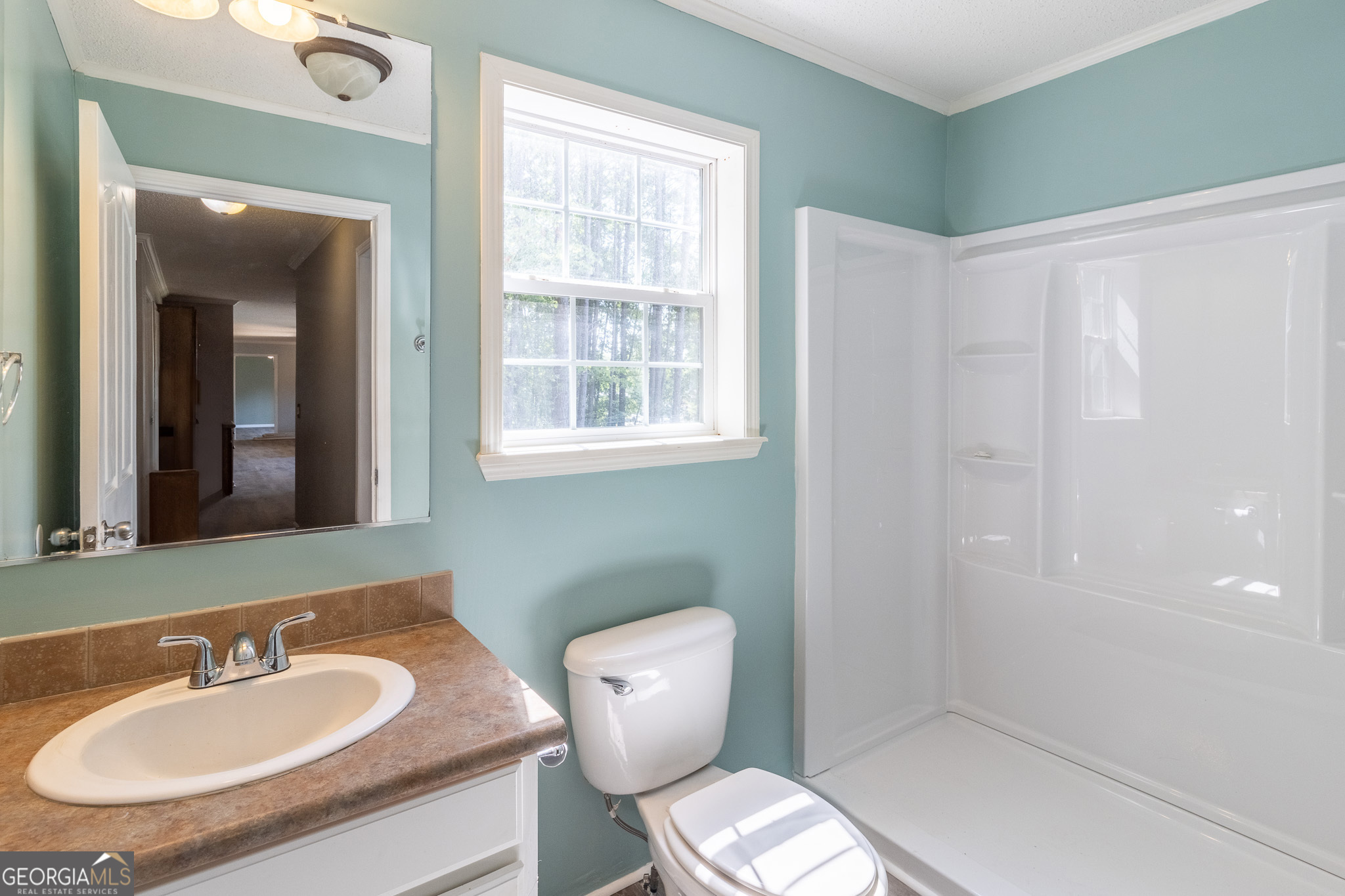 145 County Road Cedar Bluff, AL 35959 - Photo 17 of 21 a bathroom with a toilet sink and mirror