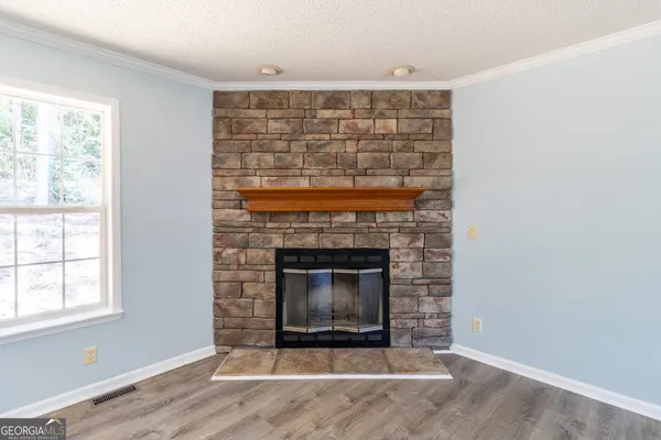 a living room with a fireplace