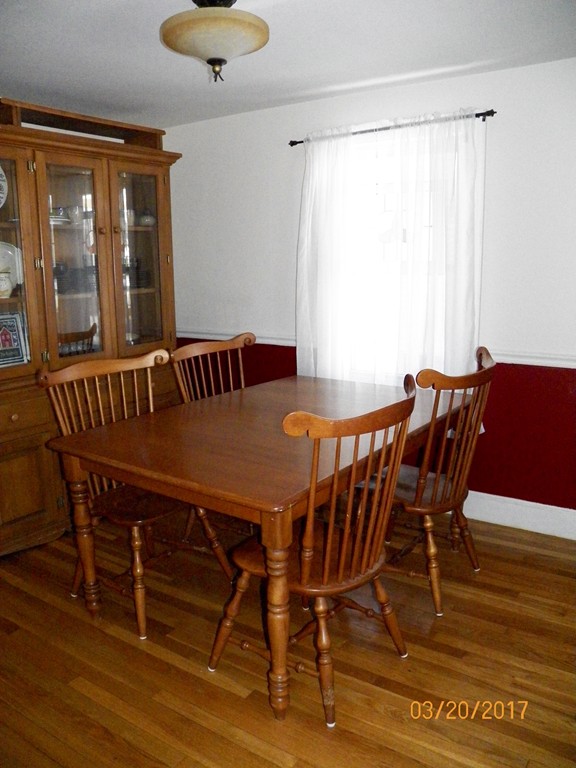 28 Edgemont Road Braintree, MA 02184 - Photo 7 of 19 a view of a dining room with furniture window and wooden floor