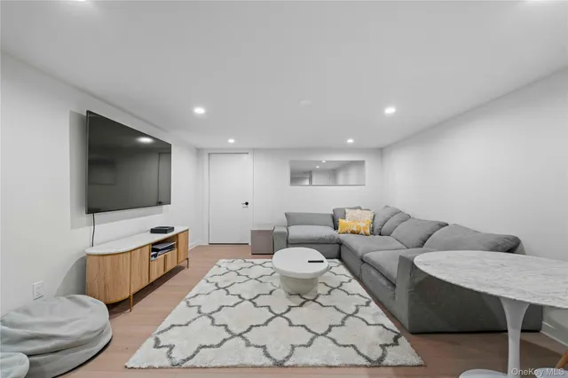a view of bathroom with a toilet sink and a mirror